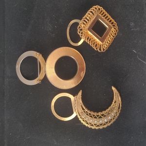 Set of three vintage scarf clips.
